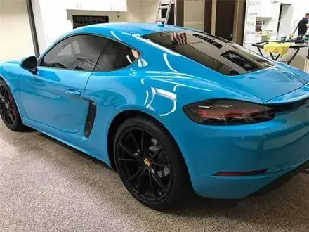 Blue Porsche with tint