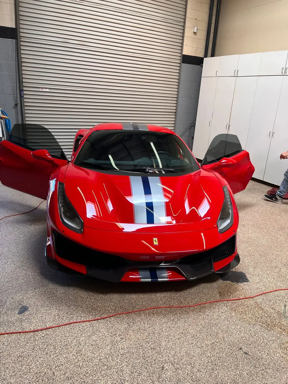 Red Ferrari with window tint