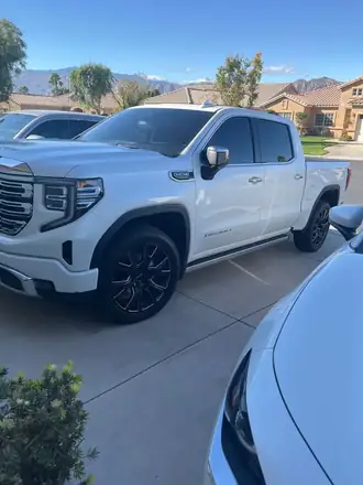 White GMC truck with tint